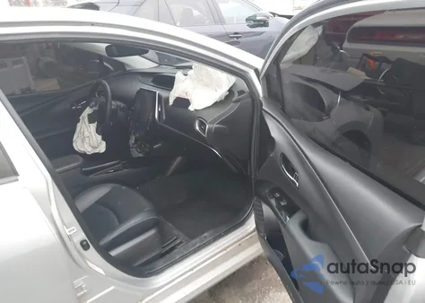 2022 Toyota Prius Prime Limited z USA, uszkodzony, nr VIN JTDKAMFP0N3199106